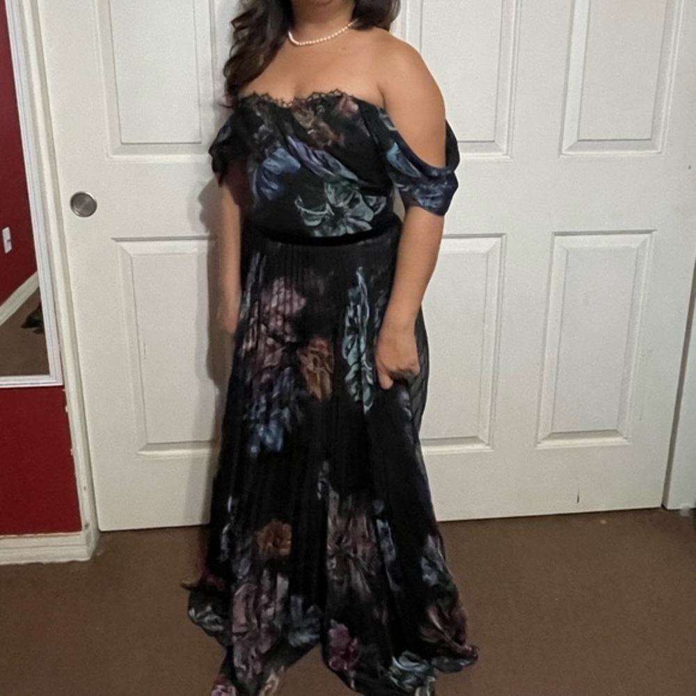 Marchessa Notte black floral printed gown.